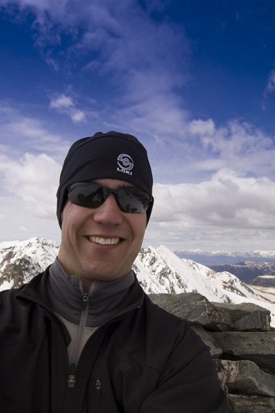wearing the hat on the summit